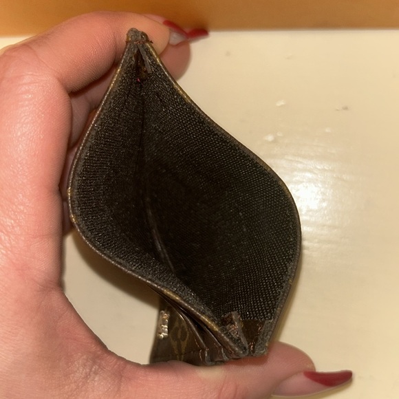 Louis Vuitton leather mini pouch with Gold raised LV - Picture 2 of 4